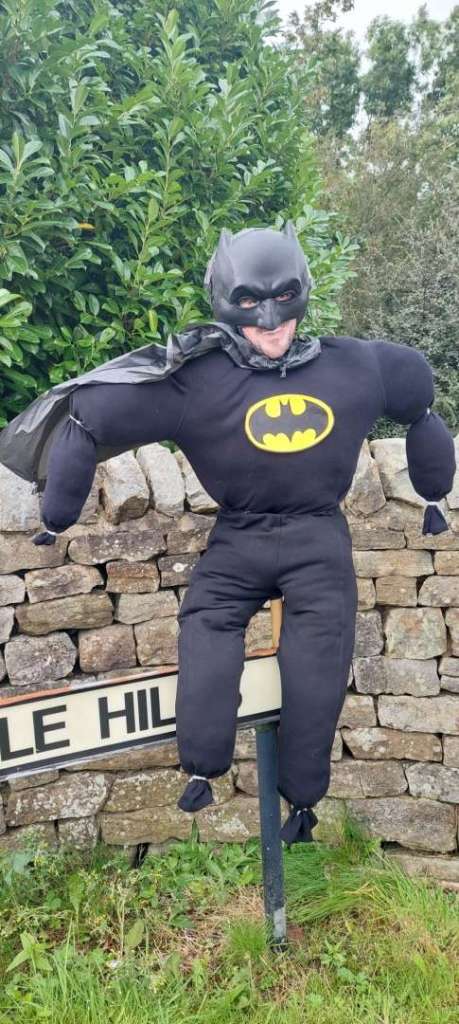 A scarecrow dressed at Batman